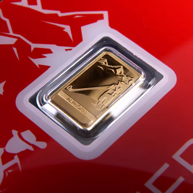 PAMP Goldbarren 1g Schweiz Alphorn Detailansicht der Vorderseite im Blister