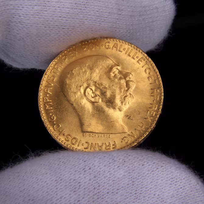 Goldmünze 20 Kronen Franz Joseph I. 1915 in Handschuh gehalten, Vorderseite